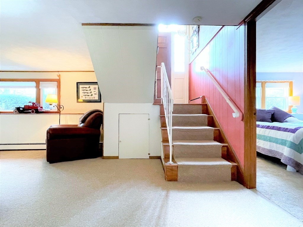 10 Phyllis Road Foxboro, MA 02035 - Photo 17 of 28 a view of livingroom with furniture and stairs