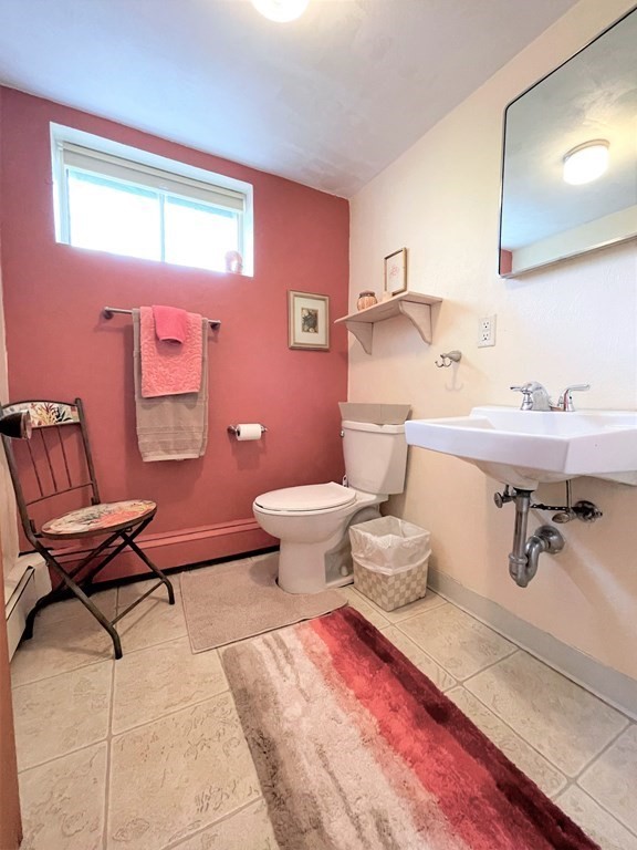 10 Phyllis Road Foxboro, MA 02035 - Photo 23 of 28 a bathroom with a sink toilet and mirror
