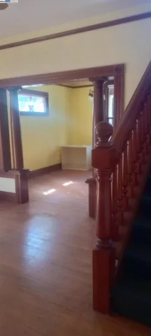 a view of gallery with stairs