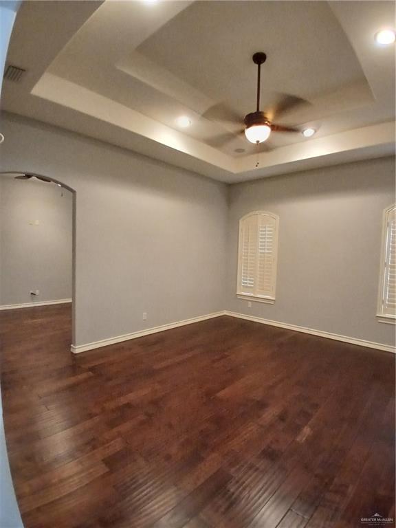 2423 West Hampton Avenue Edinburg, TX 78539 - Photo 6 of 15 a view of an empty room with wooden floor