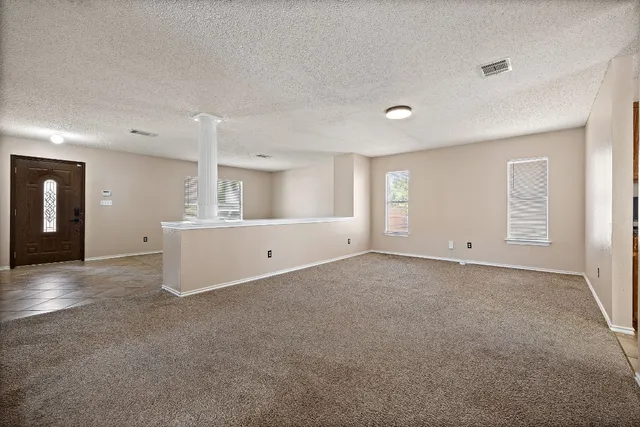 an empty room with windows