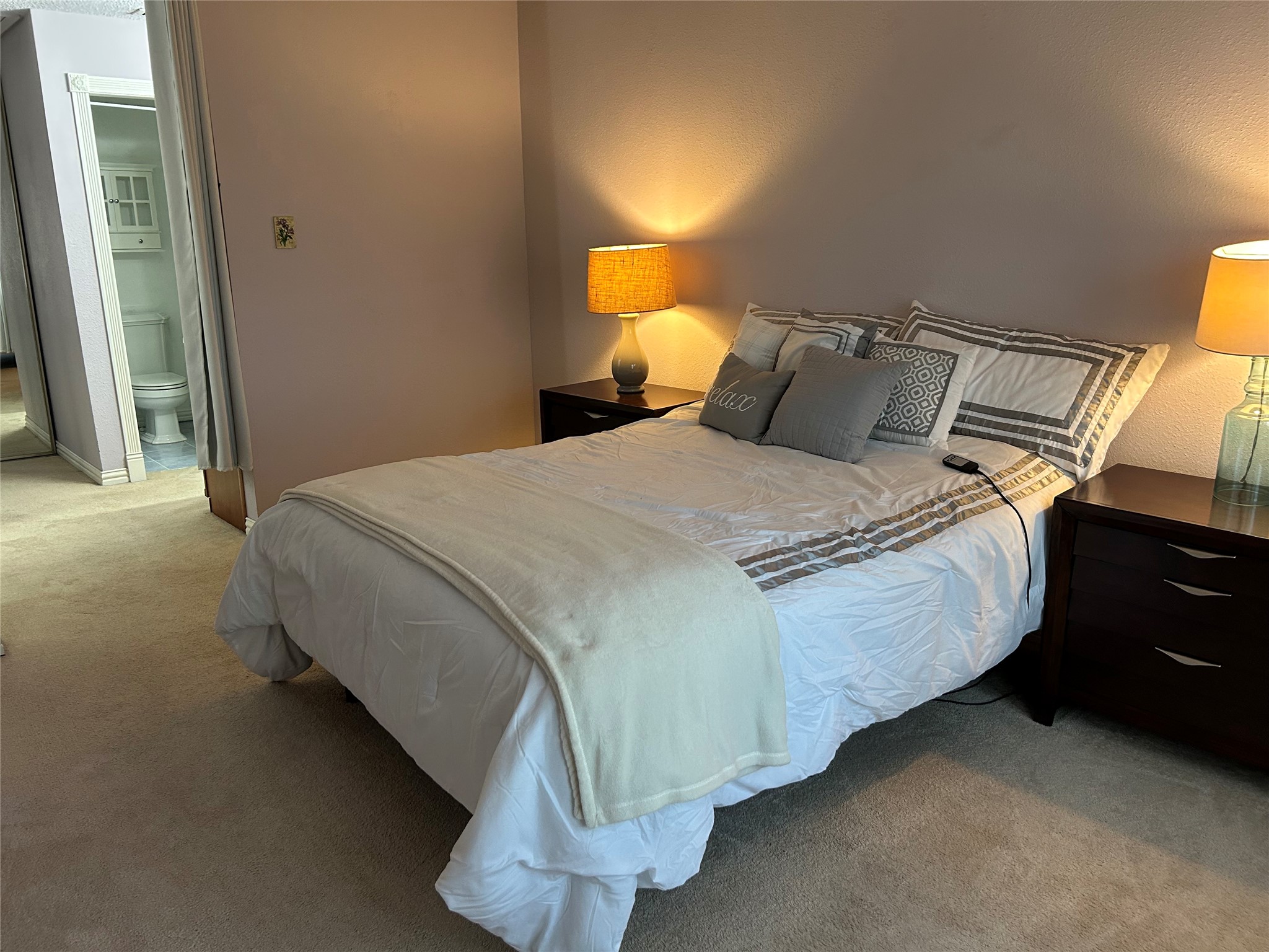 13034 Leader Street, Unit 965 Houston, TX 77072 - Photo 23 of 32 Upstairs secondary bedroom with ensuite bath.