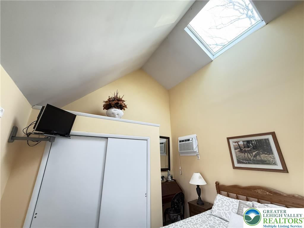 5933 Decker Road Bushkill, PA 18324 - Photo 20 of 51 a bedroom with a bed and a cabinets