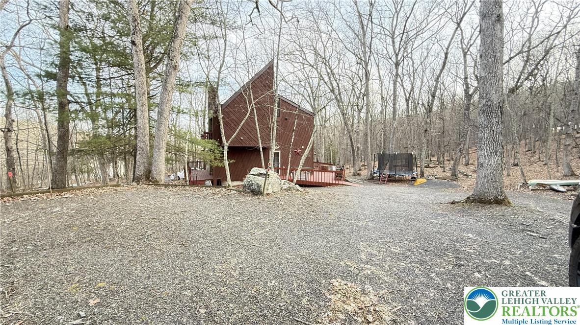 5933 Decker Road Bushkill, PA 18324 - Photo 2 of 51 a view of outdoor space with playground and green space