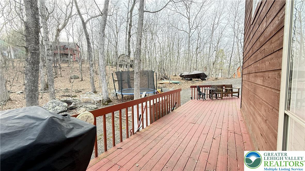 5933 Decker Road Bushkill, PA 18324 - Photo 25 of 51 a view of a balcony with chairs