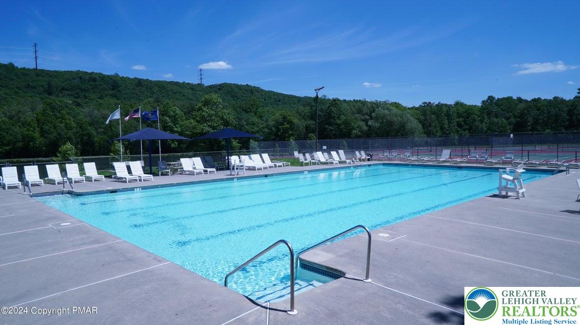 5933 Decker Road Bushkill, PA 18324 - Photo 33 of 51 a view of a swimming pool with a yard