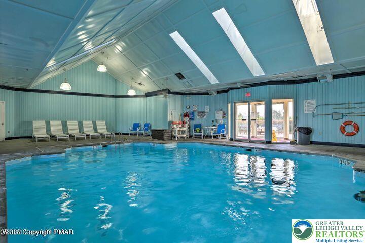 5933 Decker Road Bushkill, PA 18324 - Photo 35 of 51 a large swimming pool with a large window