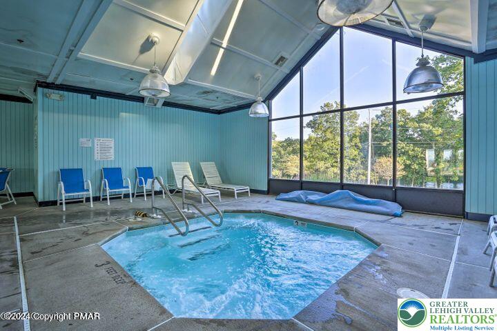 5933 Decker Road Bushkill, PA 18324 - Photo 36 of 51 a room with lots of furniture and a large window
