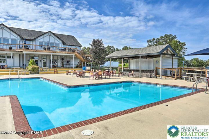 5933 Decker Road Bushkill, PA 18324 - Photo 37 of 51 a view of a house with pool and chairs