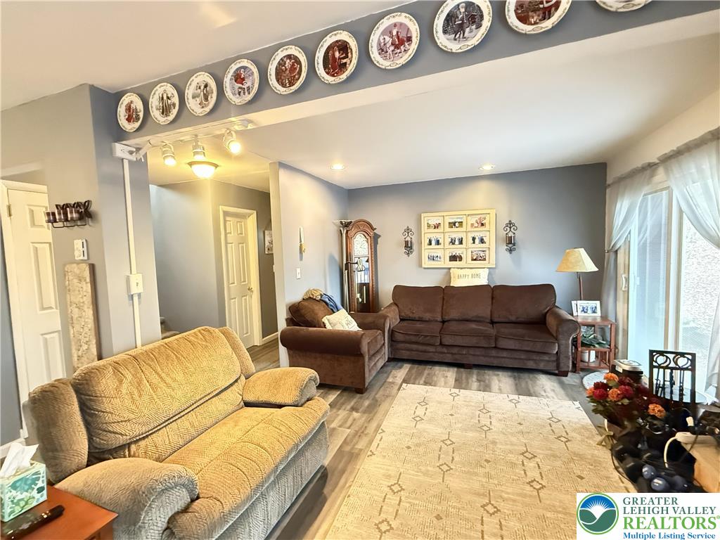 5933 Decker Road Bushkill, PA 18324 - Photo 6 of 51 a living room with furniture and a large window