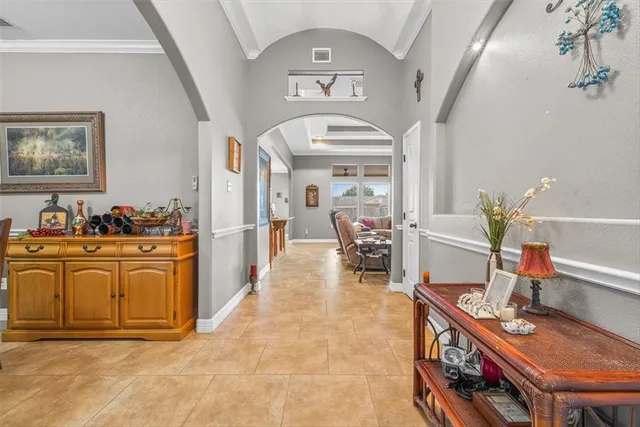 a very nice looking dining room with a table and chairs