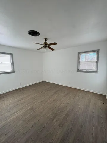 a view of a livingroom with a hardwood floor