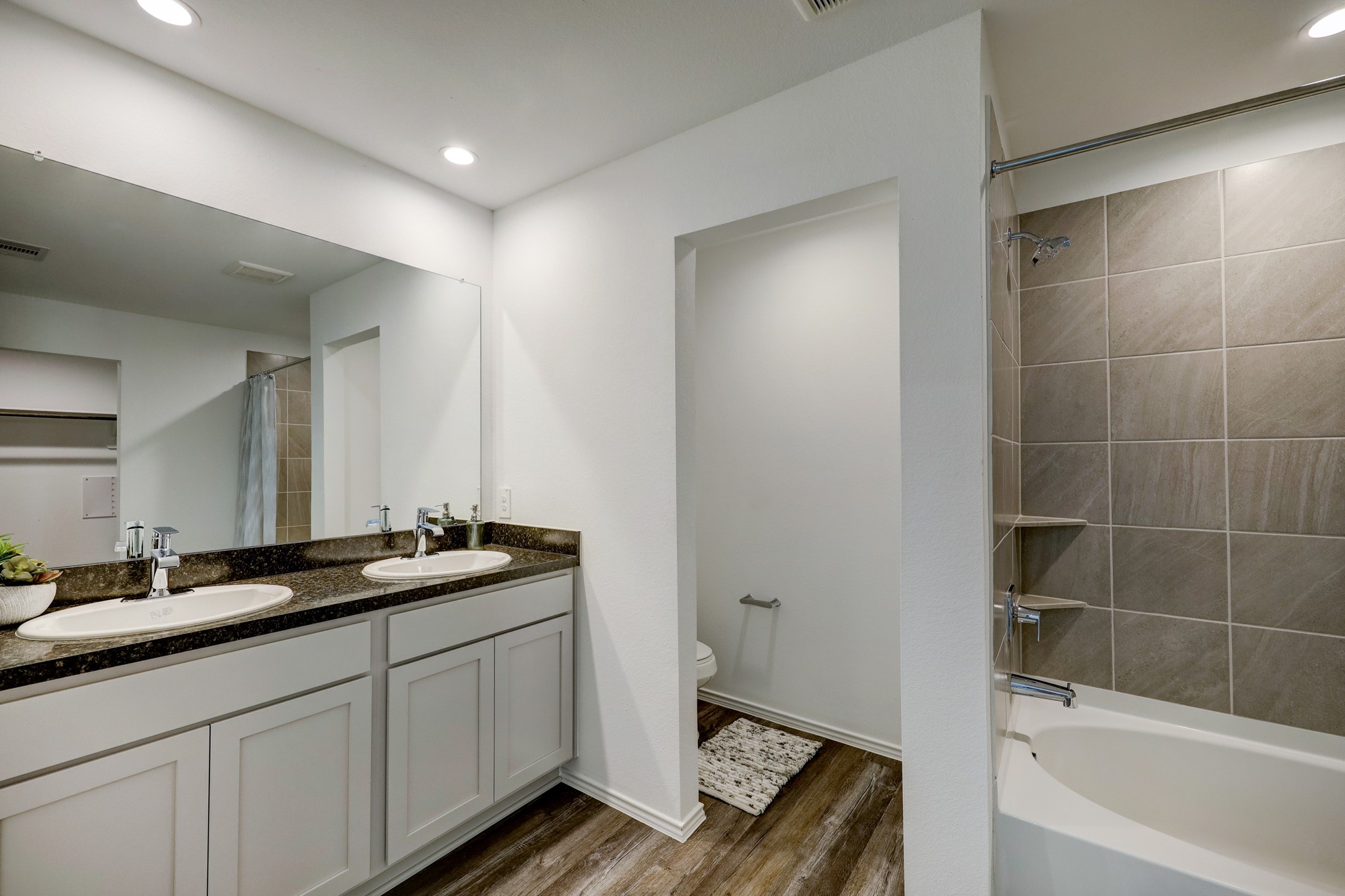 5314 Castlebury Meadows Dr Spring Spring, TX 77373 - Photo 12 of 19 Spacious primary bath with dual vanities, abundant cabinet storage, and a functional layout designed to be steamless.