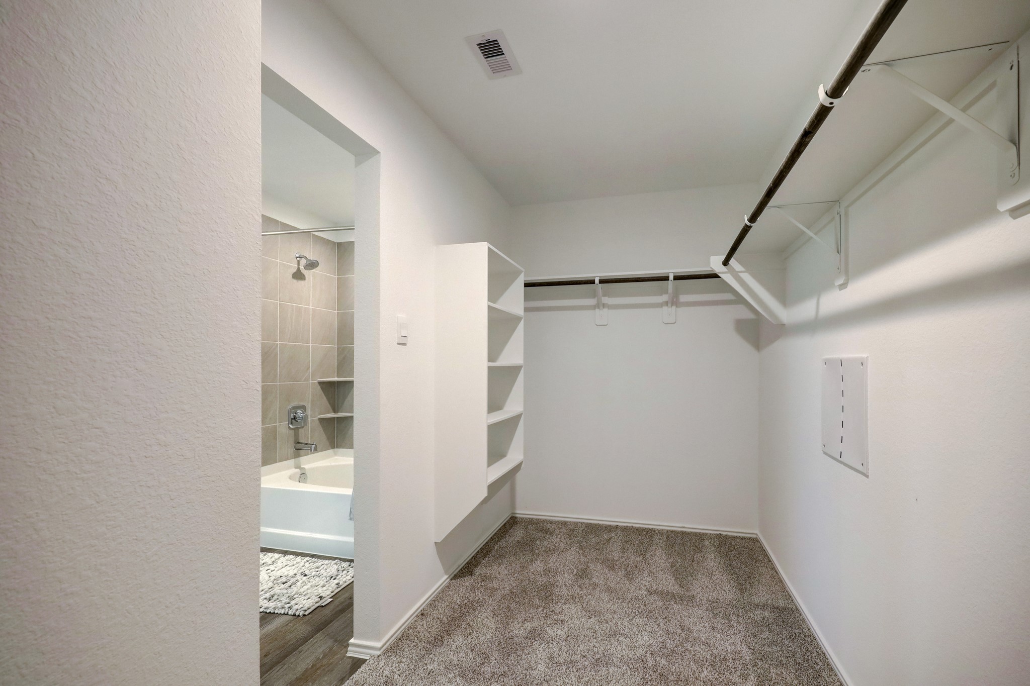 5314 Castlebury Meadows Dr Spring Spring, TX 77373 - Photo 13 of 19 Expansive walk-in closet with built-in shelving and hanging space, offering excellent organization and storage capacity.