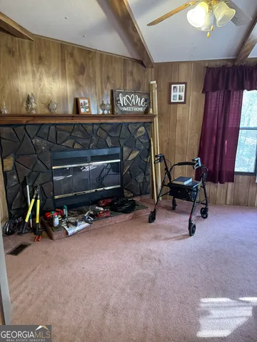 a view of room with gym equipment