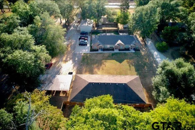 a view of a livingroom with furniture and wooden floor