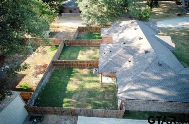 a view of outdoor space with deck and yard