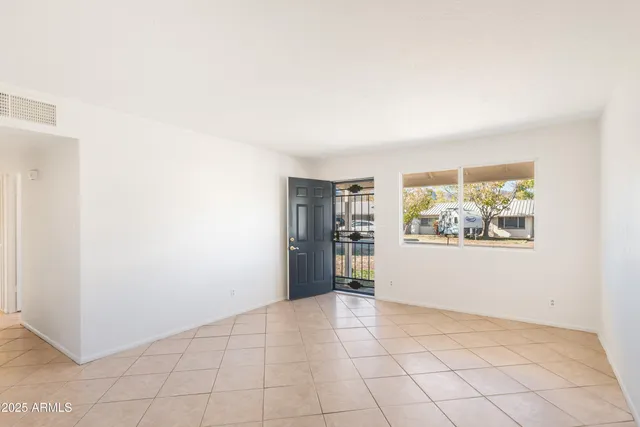 an empty room with windows