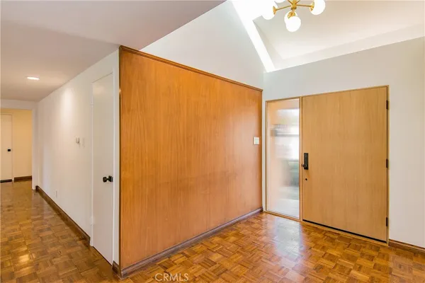 a view of hallway with livingroom