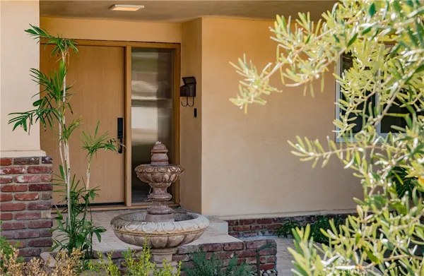 a vase of flowers sitting on a table