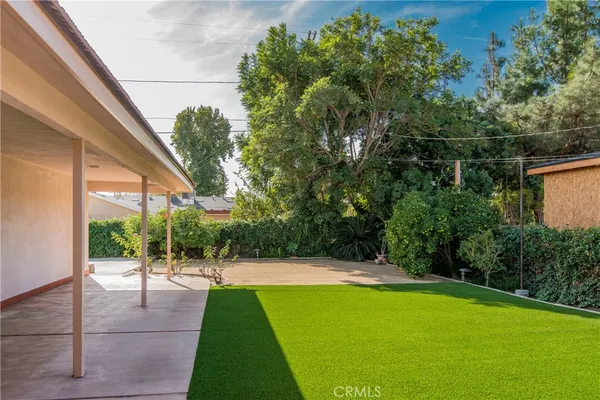 a swimming pool with yard