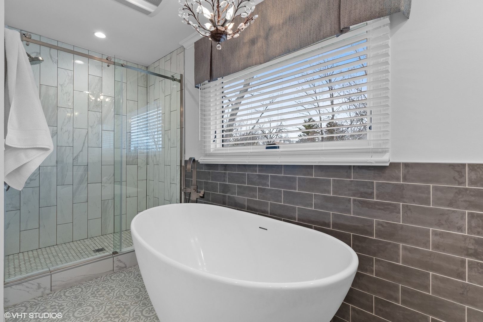 106 Park Lane Lake Bluff, IL 60044 - Photo 24 of 36 a bathroom with a bathtub a window and a shower