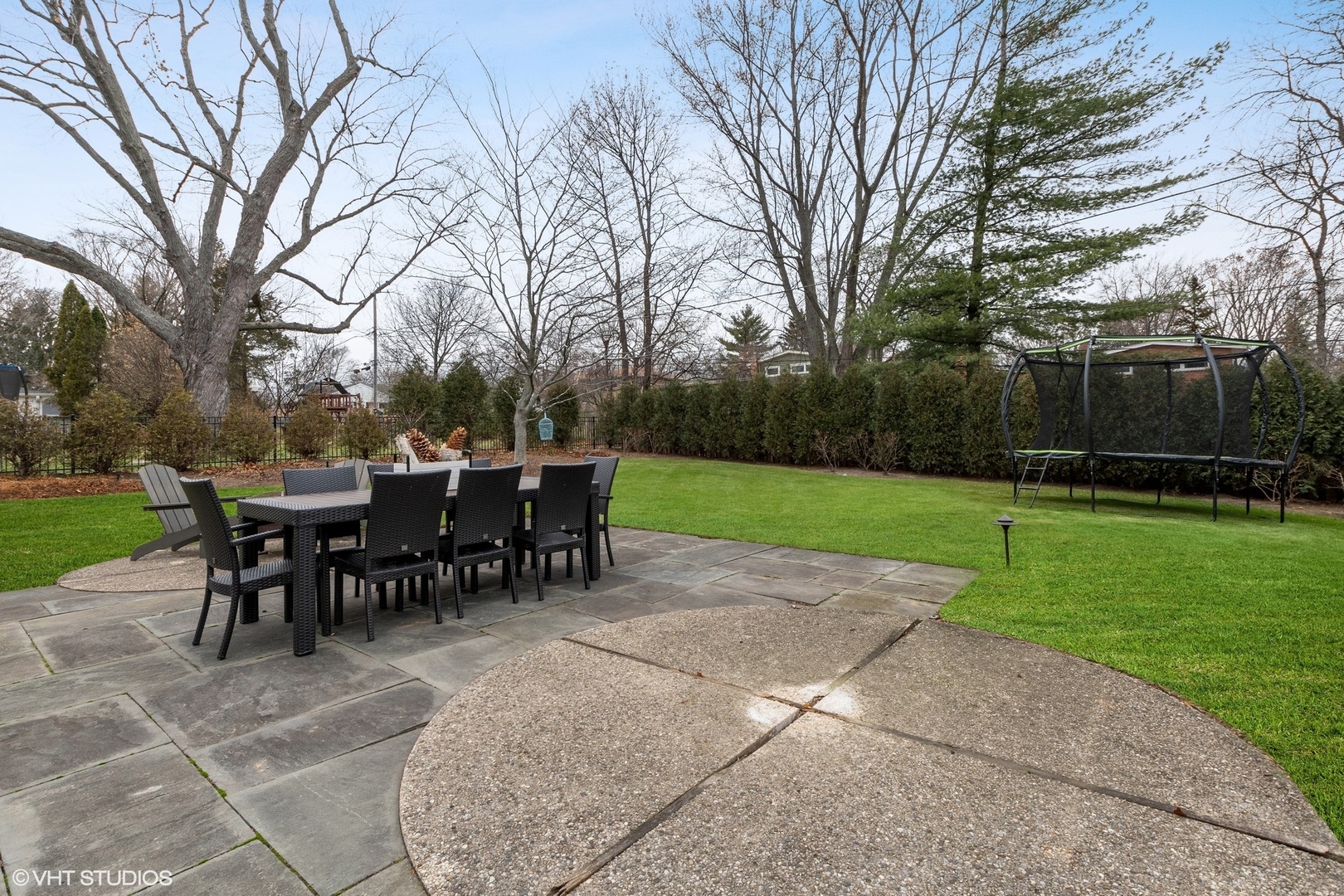 106 Park Lane Lake Bluff, IL 60044 - Photo 32 of 36 a view of a tables and chairs in back yard of the house
