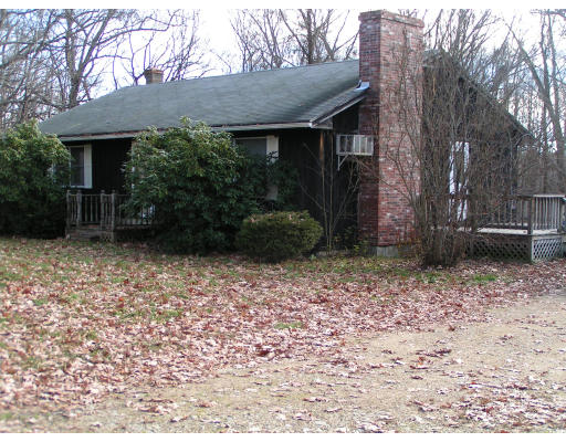 14 Rufus Putnam Road North Brookfield, MA 01535 - Photo 1 of 11 a view of a house with a yard