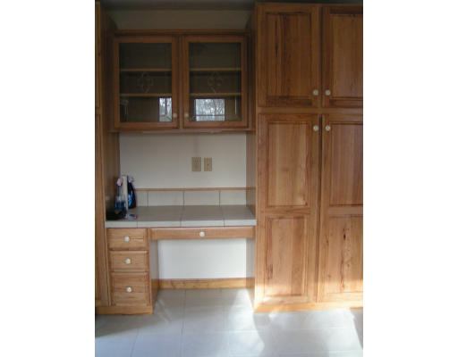 14 Rufus Putnam Road North Brookfield, MA 01535 - Photo 3 of 11 a room with a cabinets and a window