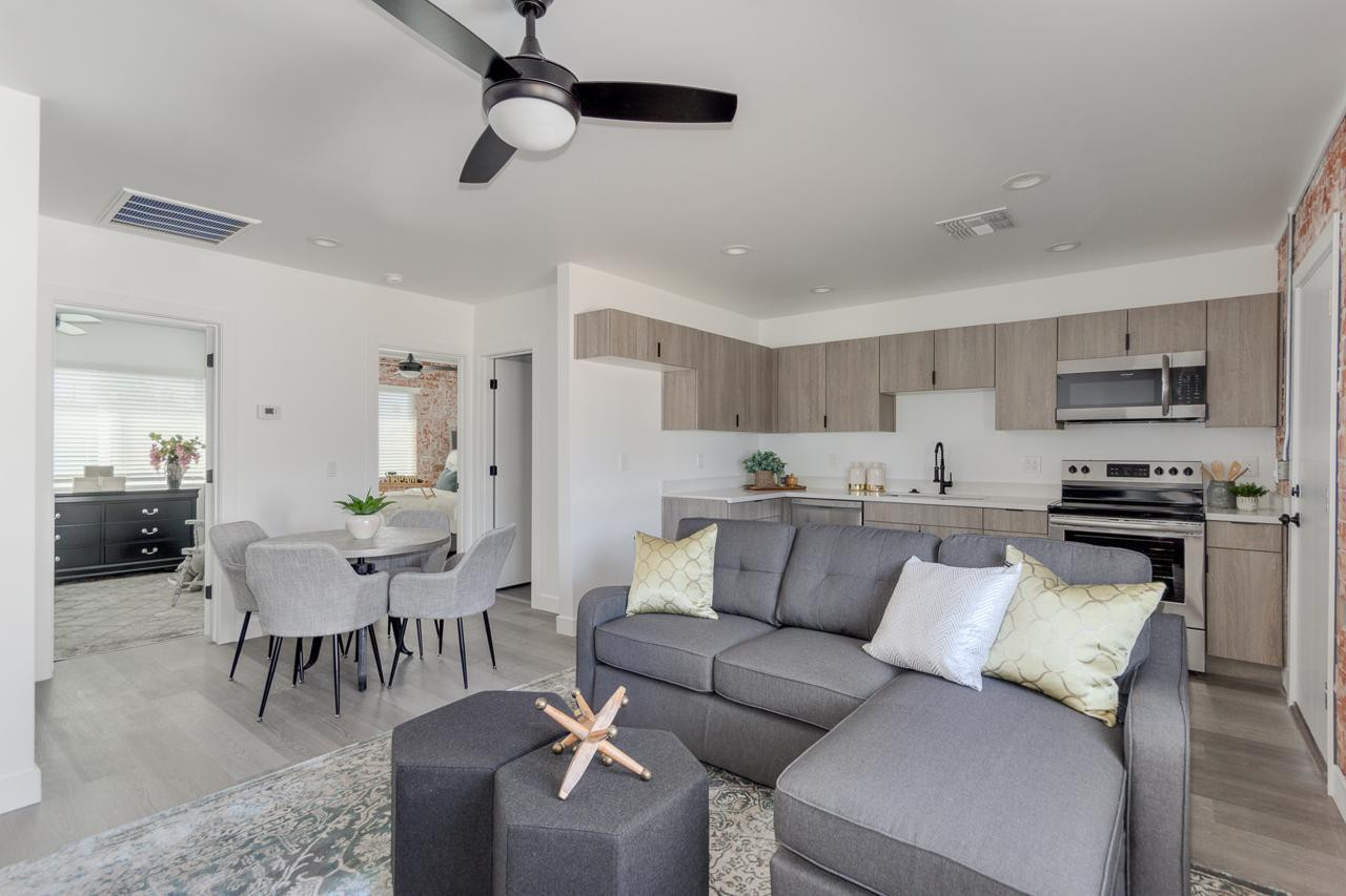 2512 East Thomas Road, Unit 1 Phoenix, AZ 85016 - Photo 6 of 24 a living room with furniture kitchen view and a window