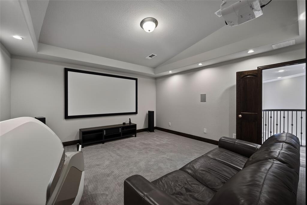 1039 Stephen Street Allen, TX 75013 - Photo 29 of 40 Carpeted home theater featuring recessed lighting and vaulted ceiling
