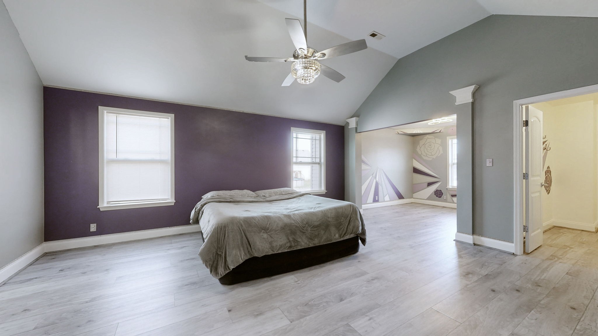 2344 Pea Ridge Road Clarksville, TN 37040 - Photo 8 of 23 a bedroom with a large bed and a chandelier