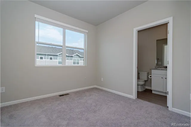 an empty room that has a window