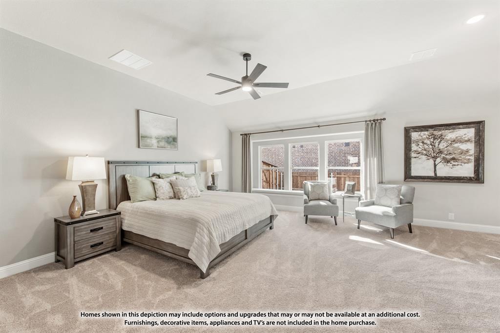 5512 Montex Road Denton, TX 76226 - Photo 19 of 25 a spacious bedroom with a bed a couch and large window