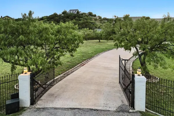 a view of a garden with a pathway