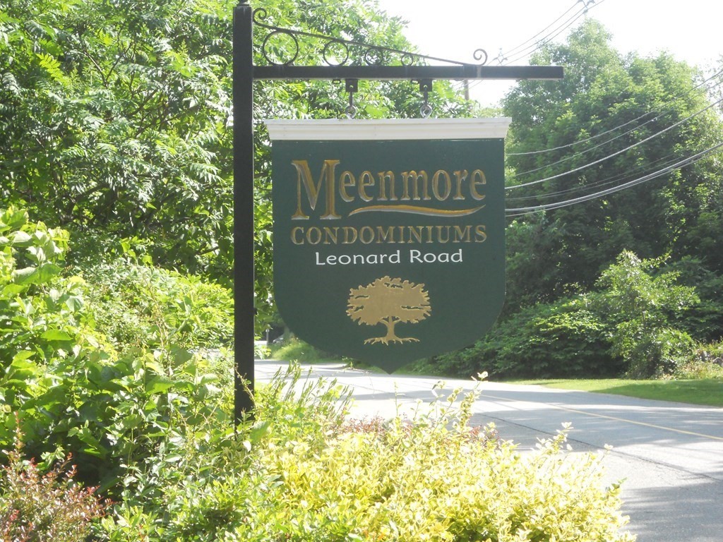 65 Leonard Road, Unit 65 Boxborough, MA 01719 - Photo 1 of 14 a sign broad on the side of a road