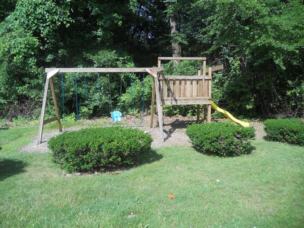 65 Leonard Road, Unit 65 Boxborough, MA 01719 - Photo 13 of 14 a view of a back yard with green space