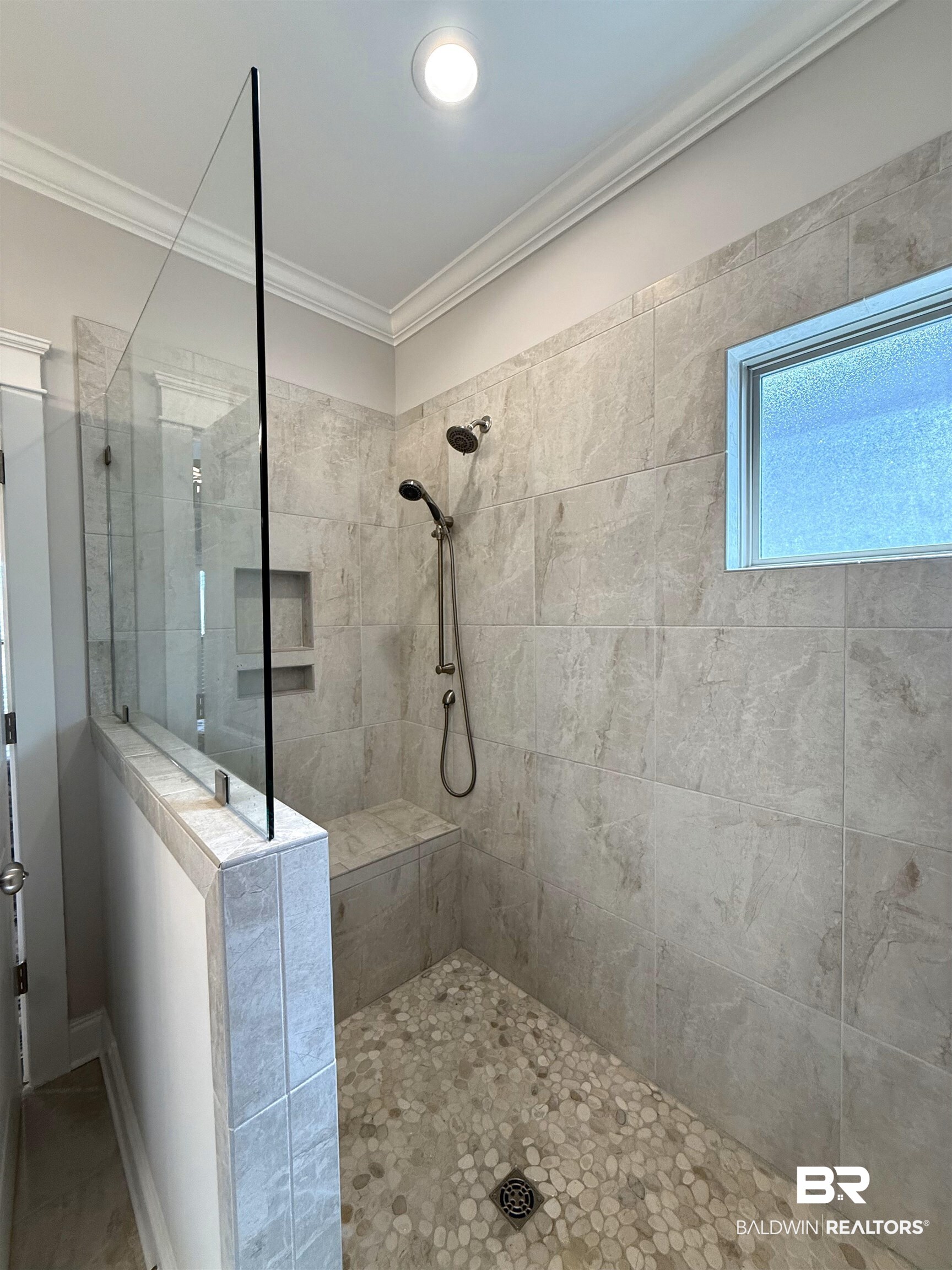 31748 Canopy Loop Spanish Fort, AL 36527 - Photo 17 of 22 Bathroom featuring a tile shower and ornamental molding
