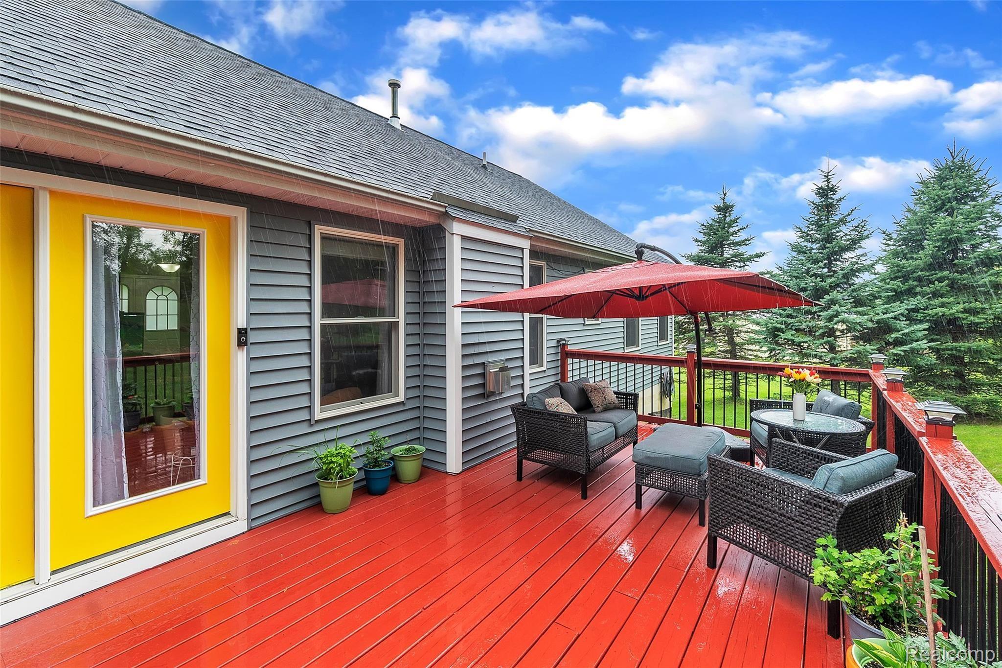 2104 Reid Road Flint, MI 48507 - Photo 25 of 31 12'x24' deck which gets afternoon sun for relaxing after work!