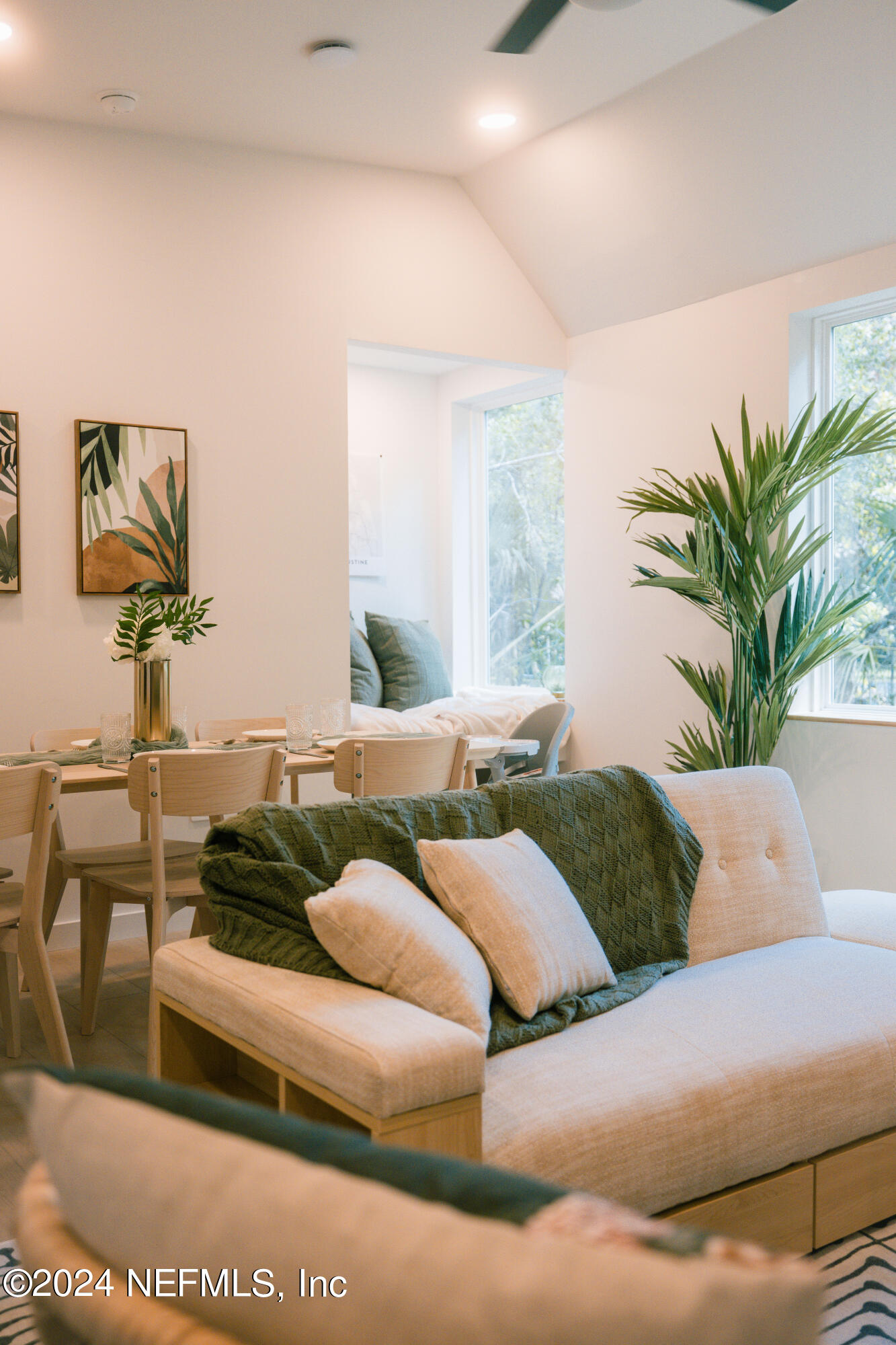 793 Chapin Street St. Augustine, FL 32084 - Photo 11 of 32 a living room with furniture and potted plant