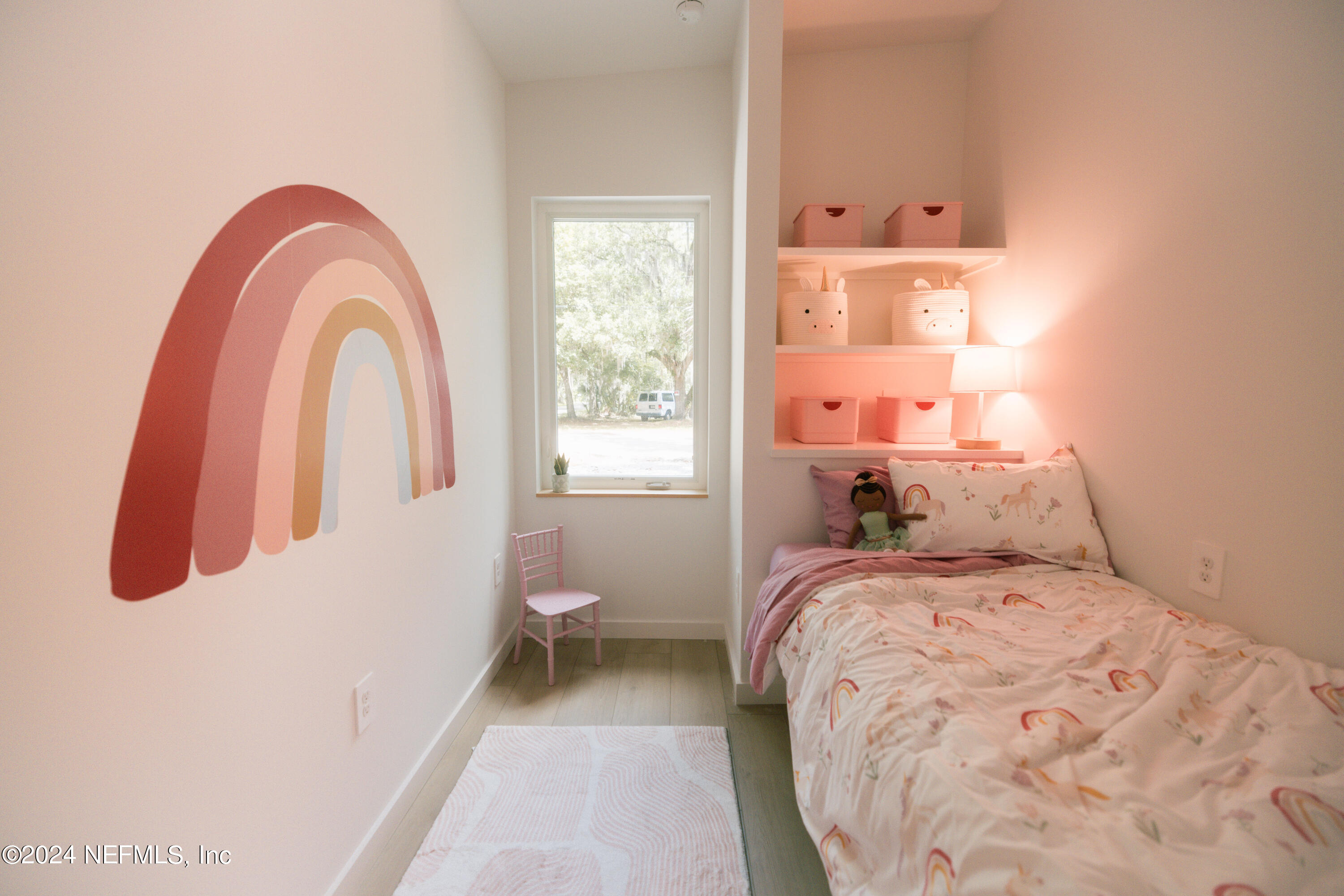 793 Chapin Street St. Augustine, FL 32084 - Photo 18 of 32 a bedroom with a bed and a window