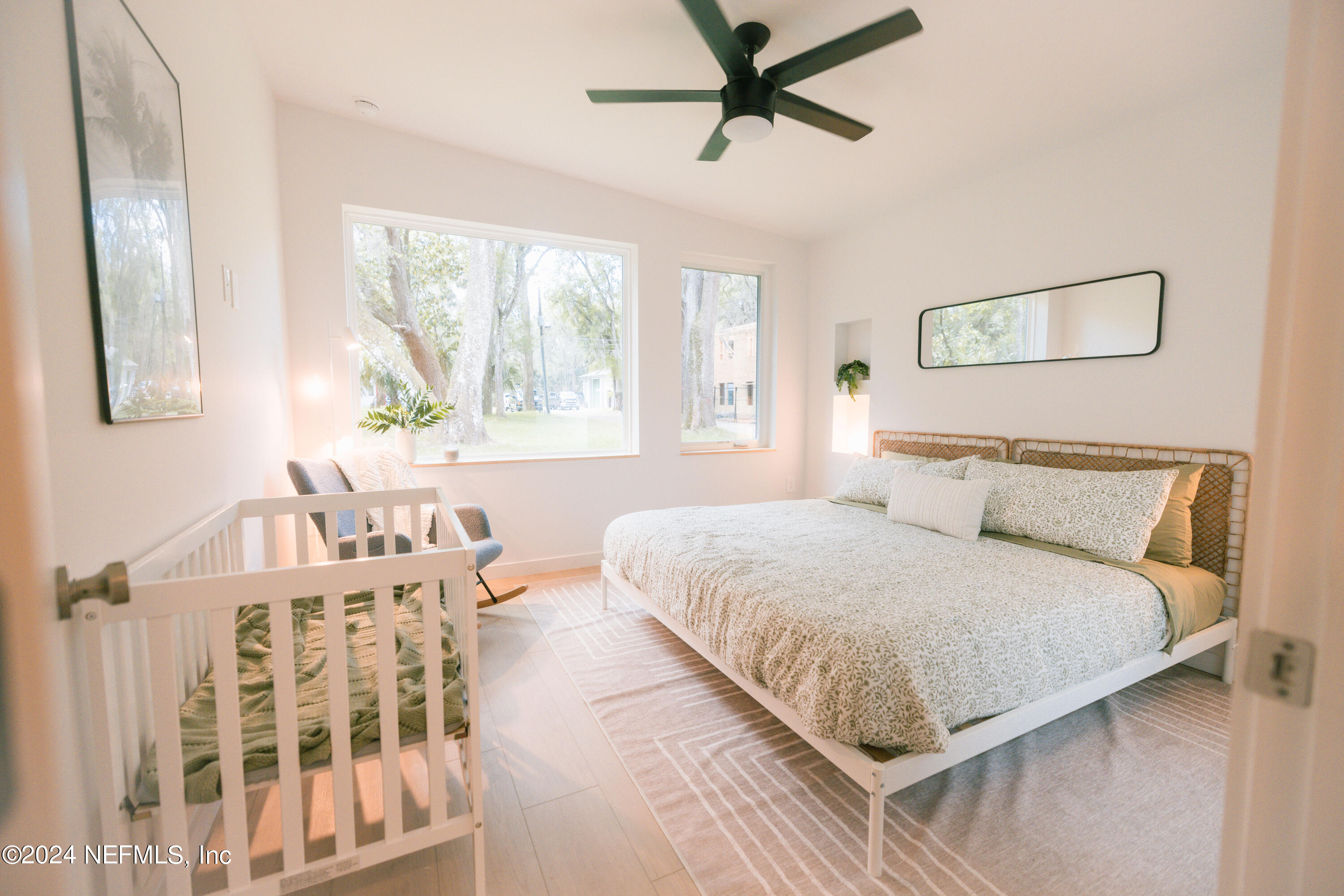 793 Chapin Street St. Augustine, FL 32084 - Photo 21 of 32 a bedroom with a bed and a window