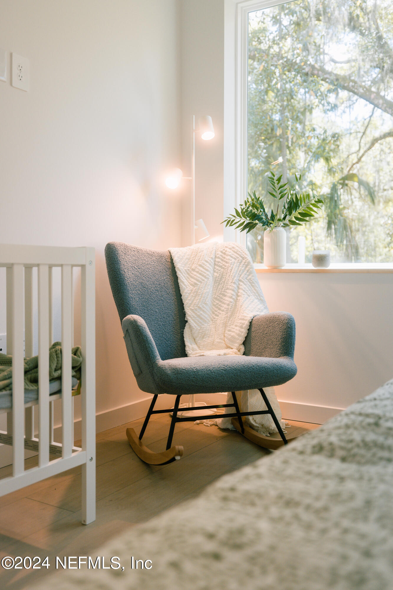 793 Chapin Street St. Augustine, FL 32084 - Photo 23 of 32 a living room with furniture and a potted plant