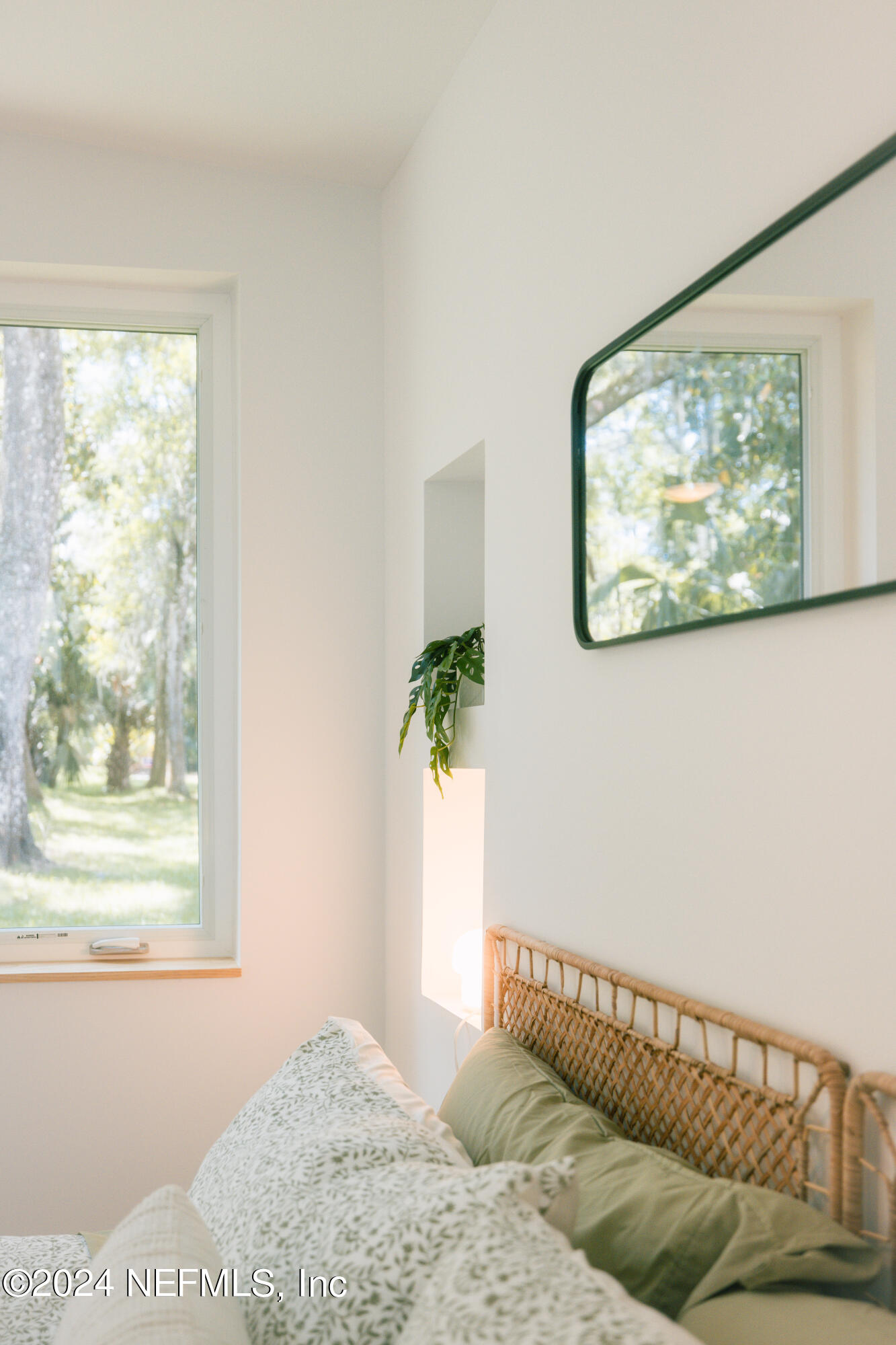 793 Chapin Street St. Augustine, FL 32084 - Photo 24 of 32 a bedroom with a bed and a window
