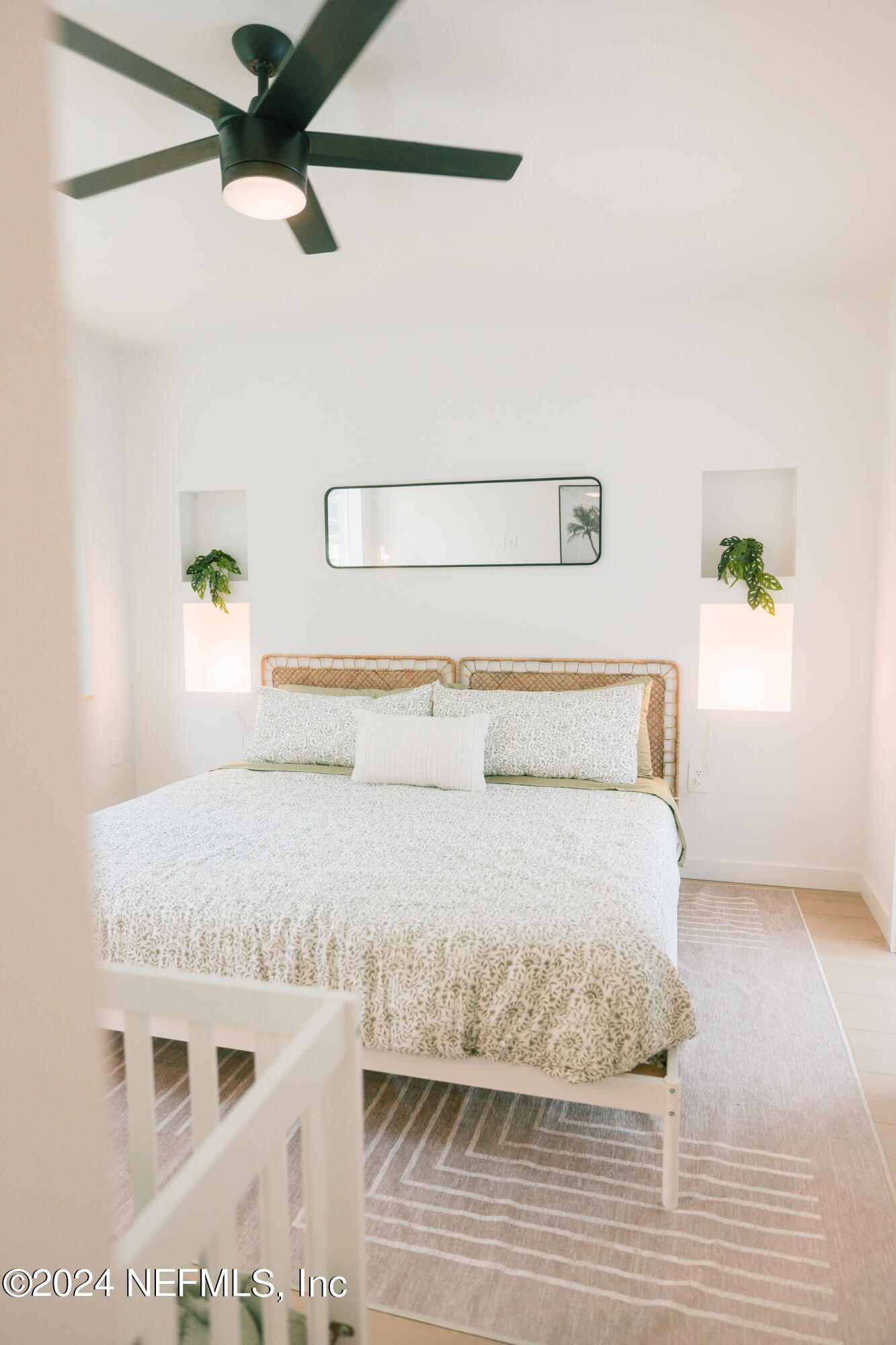 793 Chapin Street St. Augustine, FL 32084 - Photo 25 of 32 a bedroom with a bed and ceiling fan