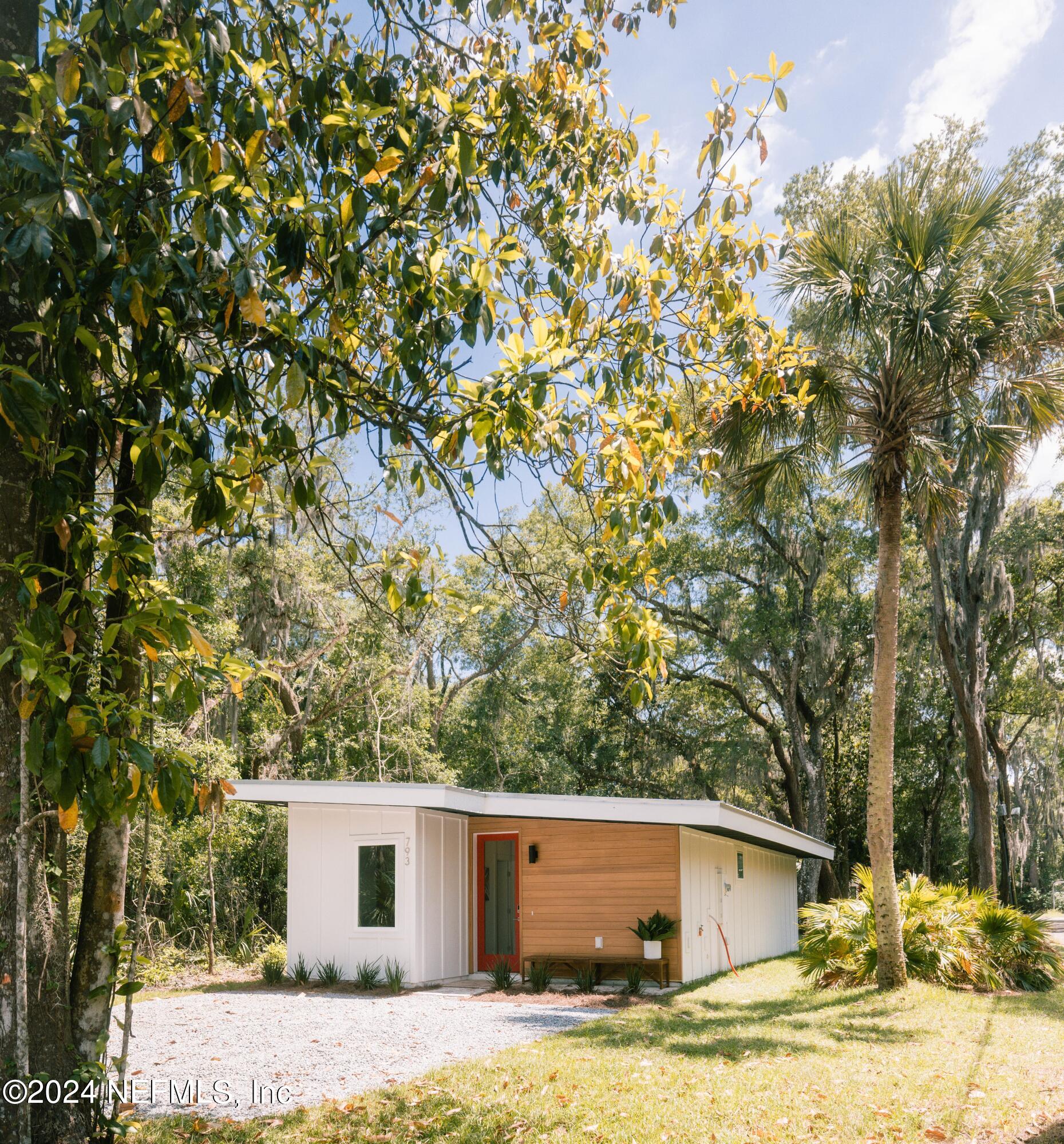 793 Chapin Street St. Augustine, FL 32084 - Photo 3 of 32 a view of a house with a tree