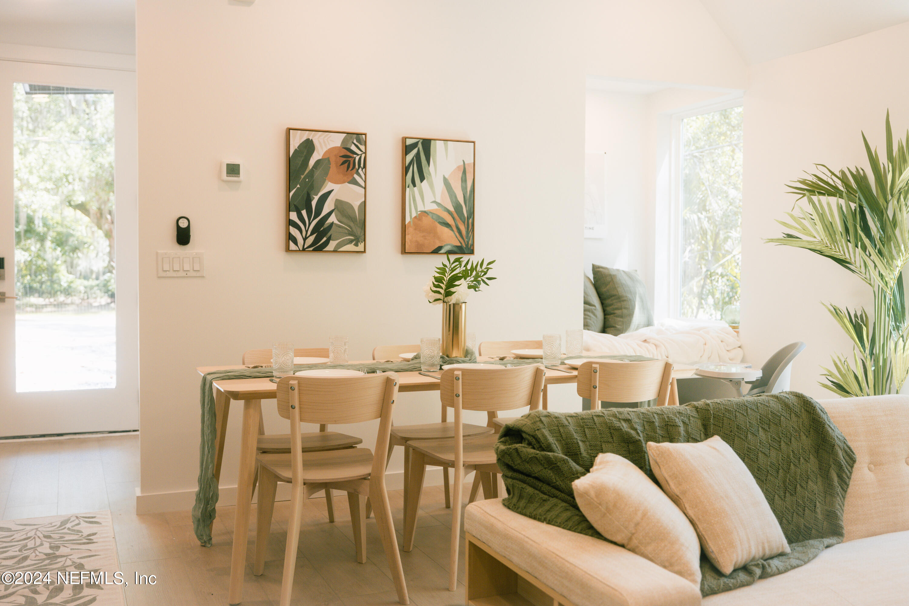 793 Chapin Street St. Augustine, FL 32084 - Photo 9 of 32 a view of a dining room with furniture and wooden floor