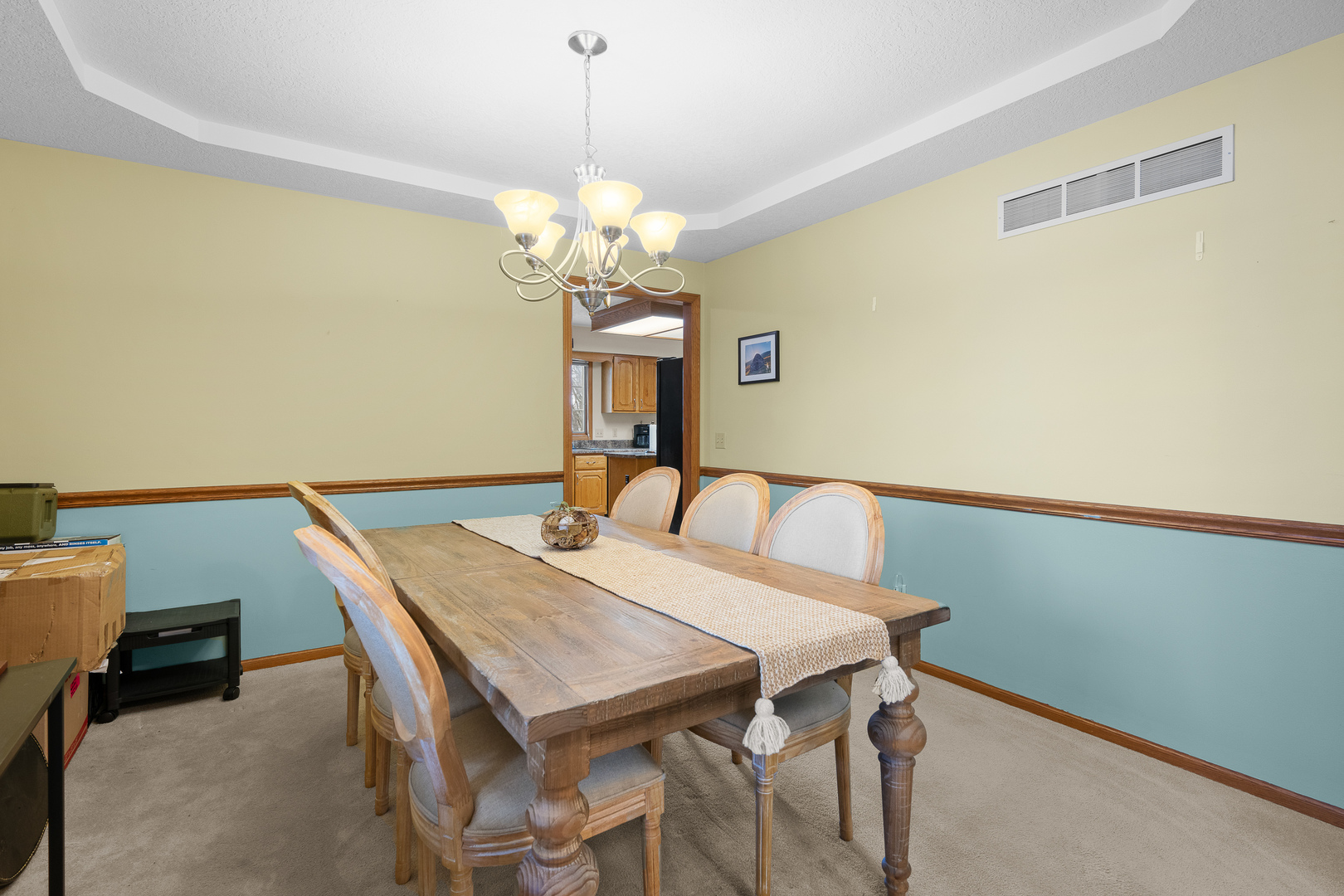 6002 Oakbrook Road Davenport, IA 52806 - Photo 18 of 50 a view of a dining room with a table and chairs