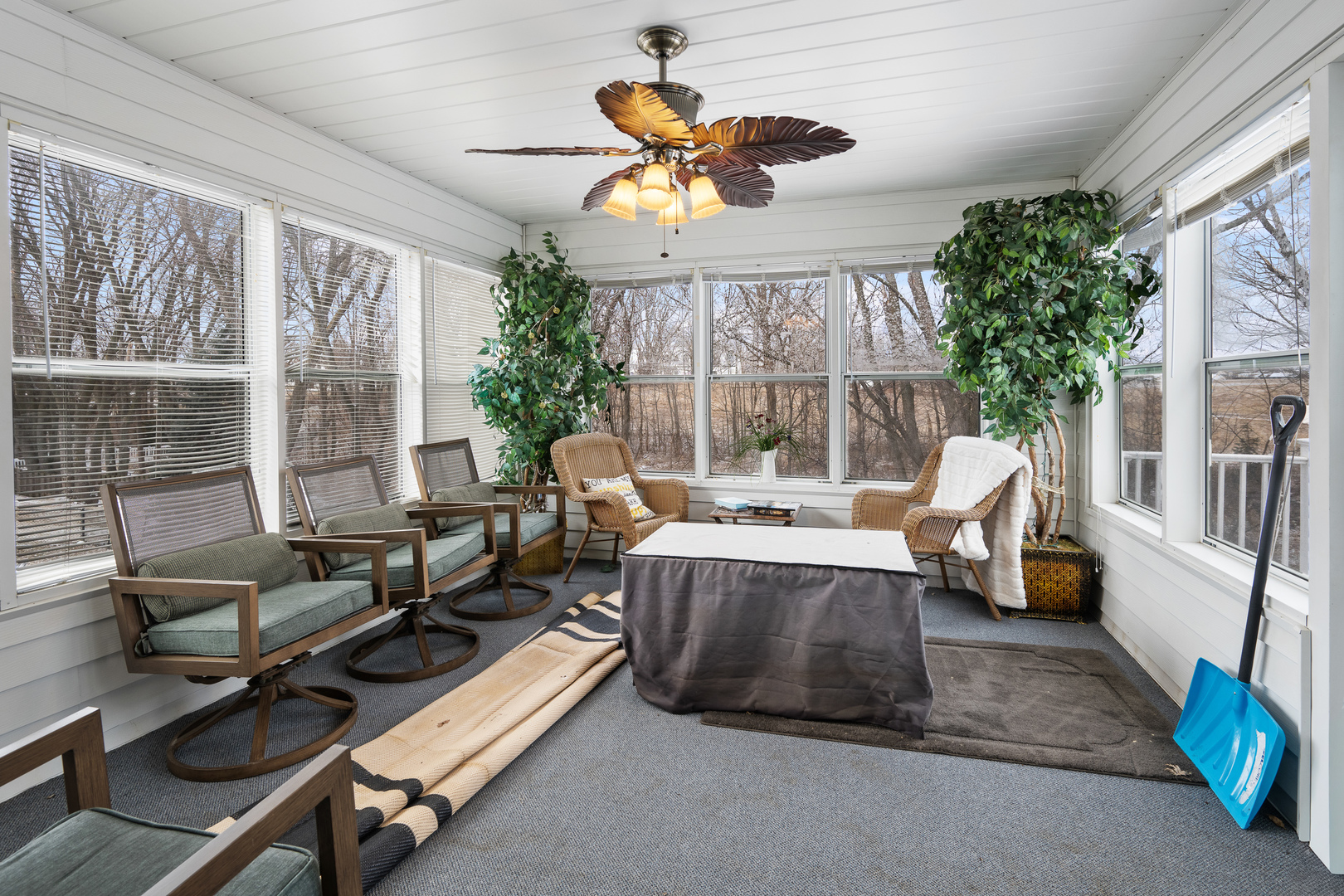 6002 Oakbrook Road Davenport, IA 52806 - Photo 19 of 50 a living room with patio furniture and a large window