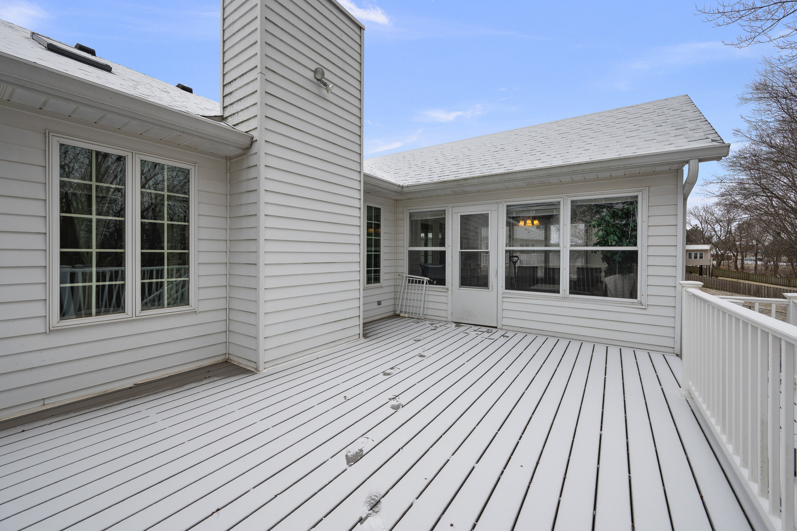 6002 Oakbrook Road Davenport, IA 52806 - Photo 21 of 50 a view of a house with a large window